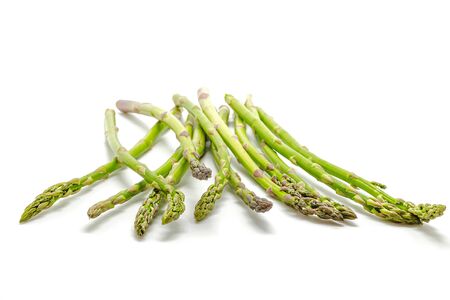 Green asparagus isolated on whiteの写真素材