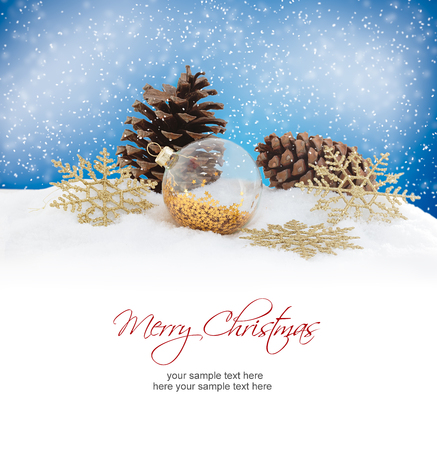 Christmas ornaments on snowy background. Winter holidays concept.の写真素材