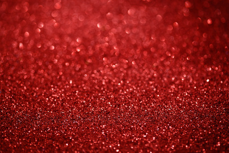 Defocused abstract red lights. Glitter Christmas backgroundの写真素材