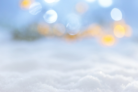 Winter christmas landscape and defocused lightsの写真素材