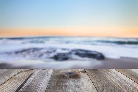 Wooden desk space and sea landscapeの写真素材