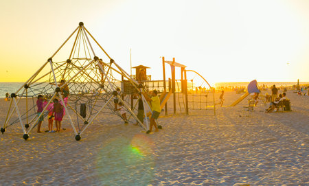 ROTA, SPAIN - SEPTEMBER 09, 2016:  Rota Beach. Family enjoying the sunset on the beach. Rota, CÃ¡diz.のeditorial素材