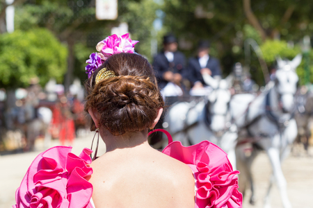 Woman wearing Spanish flamenco dress.の写真素材