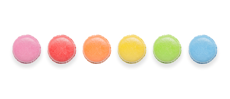 Top view of tasty colorful macaroons on white background.の写真素材