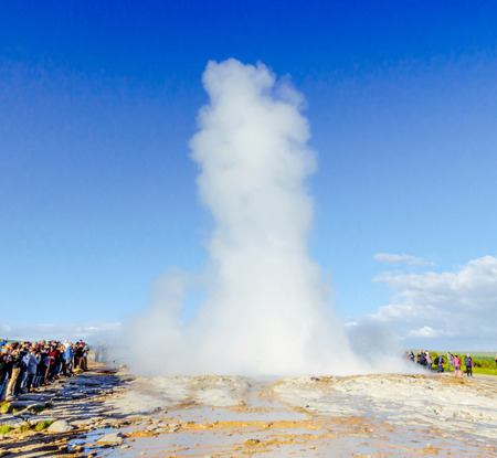 Eruption of Strokkur geyser with blue sky in summer. Golden Circle, Iceland.の写真素材