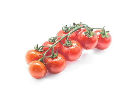 Bunch of fresh cherry tomatol on white background.の写真素材