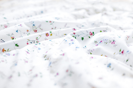Colorful and floral bed sheets background