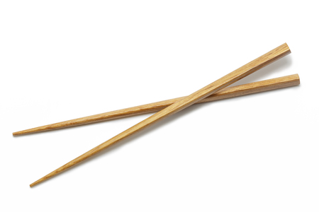 Wooden Chopsticks isolated on white background. Asian Food Chopsticksの写真素材