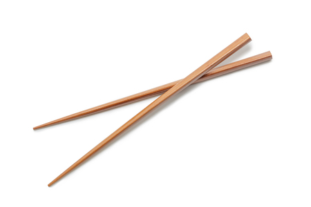Wooden Chopsticks isolated on white background. Asian Food Chopsticksの写真素材
