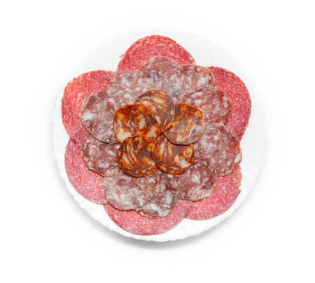 Assorted Iberian pork cured sausages dish isolated on white background. Top viewの写真素材