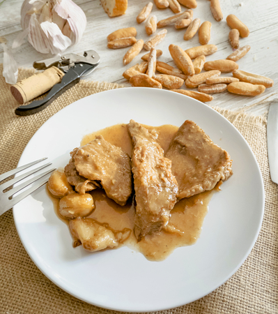 Iberian pork tenderloin in Whiskey Sauce. Traditional spanish tapas. の写真素材