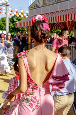 Seville, Spain - May 03, 2017:  Beautiful Women dressed in traditional costumes at the Seville's April Fair.のeditorial素材