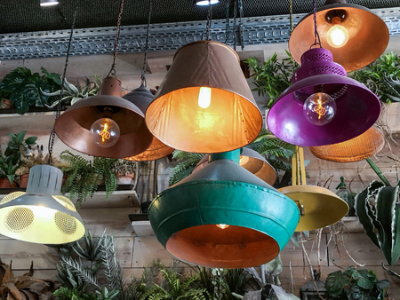 Retro vintage style lamps decorated interior room and hanging from ceiling.の写真素材
