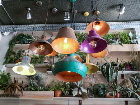 Retro vintage style lamps decorated interior room and hanging from ceiling.の写真素材