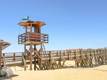 Isla Cristina beach and wood bridge in Costa de la Luz, Huelva, Spainの写真素材
