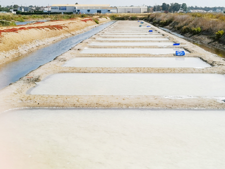 Traditional saltworks. Isla Cristina, Huelva, Spain. Deposits sediments, canals and mud flats. Southern Andalusia saltworks.の写真素材