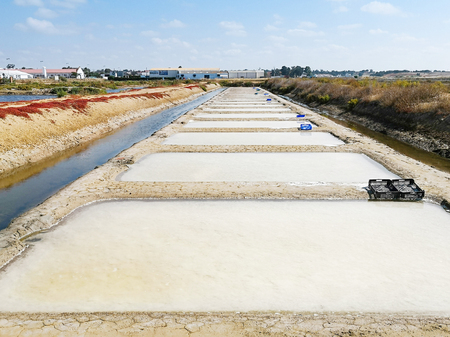 Traditional saltworks. Isla Cristina, Huelva, Spain. Deposits sediments, canals and mud flats. Southern Andalusia saltworks.の写真素材