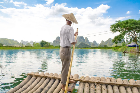 Traditional bamboo raft on Yulong River, Yangshuo, Guangxi, China.の写真素材
