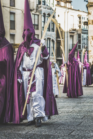 Zamora, Spain - March 25, 2018: Religious brotherhoods parading in a procession in celebration of Easter in the historic center of the Zamora city, Spain. Holy Week in Zamora, Spain (easter week) is the annual commemoration of the Passion of Jesus Christ.のeditorial素材