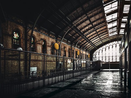 Top of old Seville railway Station. Interior architecture of Plaza de Armas old train station. Spain.のeditorial素材