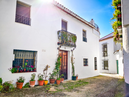 Beautiful Street in Cortelazor, Sierra de Aracena, province of Huelva. Charming white village in Andalusia. Picturesque travel destination on Spain.の写真素材