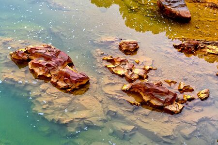 Colorful river rocks  in The River Odiel.の写真素材
