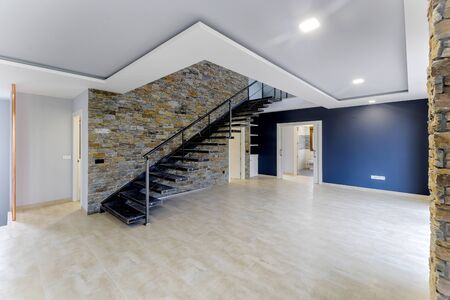 Interior modern empty house. Beautiful living room without furniture.の写真素材
