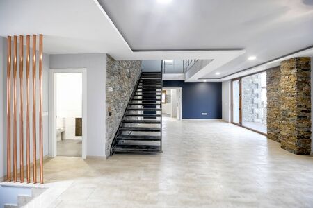 Interior modern empty house. Beautiful living room without furniture.の写真素材