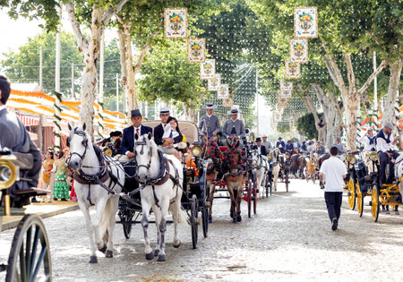 Seville, Spain - May 09, 2019 : Horse drawn carriages exhibition at the April Fair (Feria de Abril), Seville Fair (Feria de Sevilla), Andalusia, Spainのeditorial素材