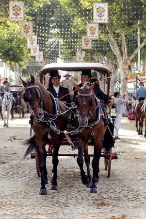 Seville, Spain - May 09, 2019 : Horse drawn carriages exhibition at the April Fair (Feria de Abril), Seville Fair (Feria de Sevilla), Andalusia, Spainのeditorial素材