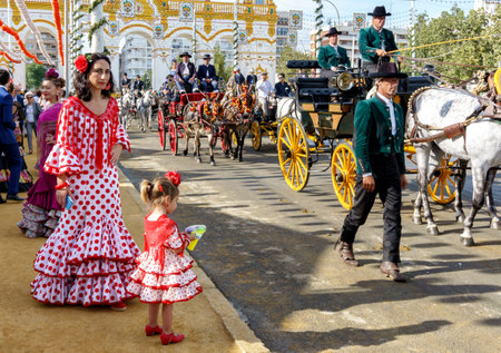 Seville, Spain - May 09, 2019 : Horse drawn carriages exhibition at the April Fair (Feria de Abril), Seville Fair (Feria de Sevilla), Andalusia, Spainのeditorial素材