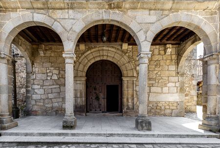 Entrance door and main facade of ancient church in San MartÃ­n del CastaÃ±ar.の写真素材