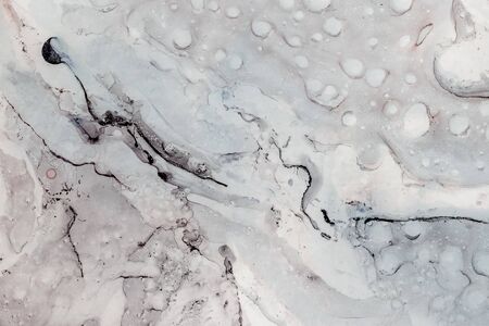 Abstract modern painting background. Contemporary art. Oil and alcohol inks painting on canvas. Mixing of painting techniques.の写真素材