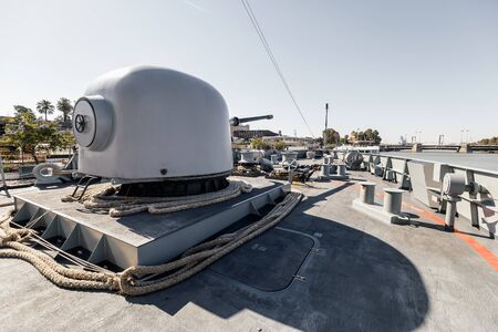 Modern naval main gun mounted on the maritime action warship use for naval warfare.の写真素材