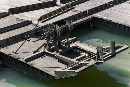Manual winch on floating boat bridge mounted by the regiment of pontoniers and Engineers of the Spanish army.の写真素材