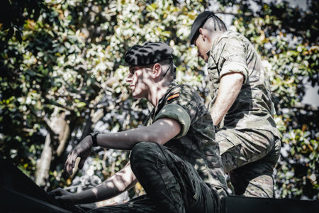 Seville, Spain - May 30, 2019: Soldiers inside a Military Tank during exhibition the Spanish Armed Forces Day celebrated in Seville..のeditorial素材