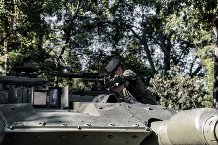 Seville, Spain - May 30, 2019: Soldier inside a Military Tank during exhibition the Spanish Armed Forces Day celebrated in Seville.のeditorial素材