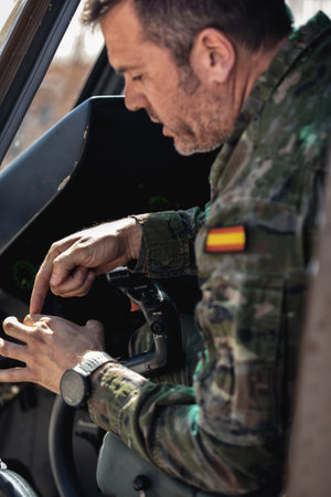 Seville, Spain - May 30, 2019: Army pilot inside cockpit of Attack Helicopter HA.28 Tiger during...