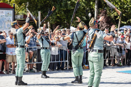 Seville, Spain - May 30, 2019: Spanish legion soldiers (unit of the Spanish Army and Spain's Rapid Reaction Force.)  during display of Spanish Armed Forces Day in Seville, Spainのeditorial素材