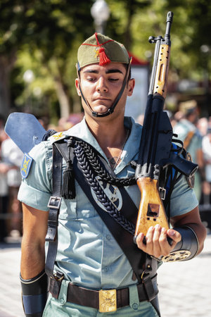 Seville, Spain - May 30, 2019: Spanish legion soldier (unit of the Spanish Army and Spain's Rapid Reaction Force.)  during display of Spanish Armed Forces Day in Seville, Spainのeditorial素材