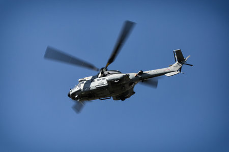 Seville, Spain - May 30, 2019: Military helicopter flying  during display of Spanish Armed Forces Day in Seville, Spainのeditorial素材