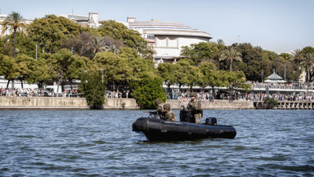 Seville, Spain - May 30, 2019: Army boat over the Guadalquivir river during display of Spanish Armed Forces Day in Seville, Spainのeditorial素材