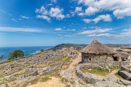 Pontevedra, Spain - August 19, 2019: Mouth of the MiÃ±o river from Ancient Celtic Village In Santa Tecla. Pontevedra. MiÃ±o river is the longest river in Galicia, sharing the border with Portugal.のeditorial素材