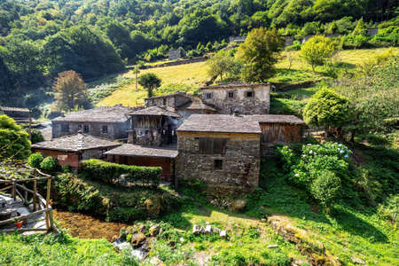 Teixois village, Los Oscos, Asturias. Ethnographic Site dates from the 18th century and is based on the integral use of the hydraulic energy of the river.の写真素材
