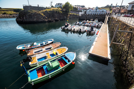 Puerto de Vega, Spain - August 23 2019: Beautiful and picturesque port in Puerto de Vega, Navia. It was awarded the title Â«Example town of AsturiasÂ» and chosen the most beautiful town in Asturias.のeditorial素材