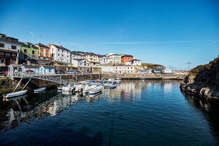 Puerto de Vega, Spain - August 23 2019: Beautiful and picturesque port in Puerto de Vega, Navia. It was awarded the title Â«Example town of AsturiasÂ» and chosen the most beautiful town in Asturias.のeditorial素材
