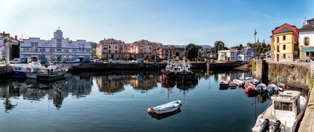 Puerto de Vega, Spain - August 23 2019: Beautiful and picturesque port in Puerto de Vega, Navia. It was awarded the title Â«Example town of AsturiasÂ» and chosen the most beautiful town in Asturias.のeditorial素材