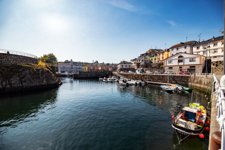 Puerto de Vega, Spain - August 23 2019: Beautiful and picturesque port in Puerto de Vega, Navia. It was awarded the title Â«Example town of AsturiasÂ» and chosen the most beautiful town in Asturias.のeditorial素材
