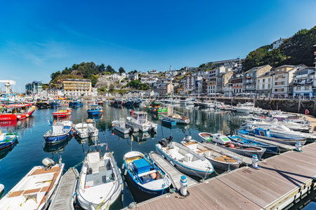 Luarca, Spain - August 23 2019: Colorful Fishery Harbor. Luarca. Asturias. Luarca is well known for its beautiful architecture, landscapes, gastronomy and tourist attractions.のeditorial素材
