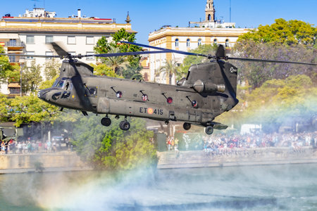 Seville, Spain - May 31, 2019: Military helicopter flying over the Guadalquivir river during display of Spanish Armed Forces Day in Seville, Spainのeditorial素材